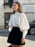 Autumn/Winter 2025 White Leisure Temperament Relaxed Small Standing Lantern Sleeves 100 Folded Commuter Style Women's Shirt 68HZ