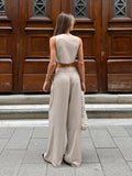 Summer Fashion Design Feel Sleeveless V Collar Umbilion Short Waist Broad-Footed Trousers Temperament Casual Takts Suit Woman 68HZ